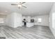 A modern kitchen featuring stainless steel appliances, white cabinets and an island at 455 Prescott Way, Villa Rica, GA 30180