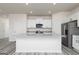 Kitchen featuring granite countertops, stainless steel appliances, and a center island at 455 Prescott Way, Villa Rica, GA 30180