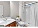 Bathroom featuring a single sink vanity and a shower with a curtain at 44 Willow Leaf Way, Sharpsburg, GA 30277