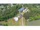 Bird's eye view of community amenities featuring tennis courts and a pool near the lake at 180 Lapis Lake Pt, Fayetteville, GA 30215