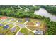 The home is centrally located in a lakeside community with mature trees and manicured lawns at 180 Lapis Lake Pt, Fayetteville, GA 30215