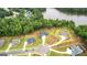 The home is centrally located in a lakeside community with mature trees and manicured lawns at 180 Lapis Lake Pt, Fayetteville, GA 30215