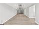 Expansive bonus room with hardwood floors, vaulted ceilings, and recessed lighting at 180 Lapis Lake Pt, Fayetteville, GA 30215