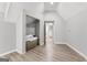 Hallway with hardwood floors and storage spaces, ready for your storage needs at 180 Lapis Lake Pt, Fayetteville, GA 30215