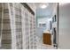 Clean bathroom with a shower, vanity, and tiled floors, providing a functional space at 75 Barber Rd, Carrollton, GA 30116