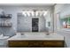 Bright bathroom boasting a dual sink vanity, large mirror, and ample natural light from the window at 75 Barber Rd, Carrollton, GA 30116