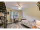 Bright bedroom featuring a bed, ceiling fan, and a neutral color scheme at 75 Barber Rd, Carrollton, GA 30116
