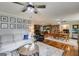 Spacious living room featuring a comfortable sofa, wooden floors and decorative wall hangings at 75 Barber Rd, Carrollton, GA 30116