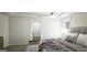 Comfortable bedroom with a ceiling fan, window, and ensuite bathroom at 100 Grande Bishop Dr, Fairburn, GA 30213