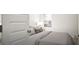 Bedroom featuring a comfortable bed, large window, and neutral decor at 100 Grande Bishop Dr, Fairburn, GA 30213