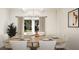 Dining room featuring a light-filled space, chandelier, and modern decor at 100 Grande Bishop Dr, Fairburn, GA 30213
