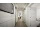 Bright hallway with hardwood floors and modern paneling at 100 Grande Bishop Dr, Fairburn, GA 30213