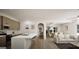 Modern kitchen with a large island, stainless steel appliances, and an open layout to the living area at 100 Grande Bishop Dr, Fairburn, GA 30213