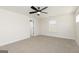 Spacious bedroom featuring neutral carpet, white trim, and a ceiling fan at 488 Cantrell Drive, Dallas, GA 30157