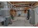 Unfinished basement area with exposed ceiling, concrete floors and mechanical equipment visible at 726 Mcdaniel Mill Sw Rd, Conyers, GA 30094
