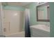 Clean bathroom featuring a shower with a shower curtain and a vanity with a sink at 726 Mcdaniel Mill Sw Rd, Conyers, GA 30094