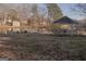 Lakeside gazebo with seating area, ideal for enjoying the outdoors at 726 Mcdaniel Mill Sw Rd, Conyers, GA 30094