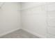 A white, empty walk-in closet equipped with wired shelving at 412 Cantrell Drive, Dallas, GA 30157