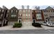 Charming townhomes with well-maintained front yards and garages in a desirable neighborhood at 6089 Indian Wood Cir, Mableton, GA 30126