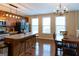 Eat-in kitchen with granite countertops, stainless appliances, and a breakfast bar at 6089 Indian Wood Cir, Mableton, GA 30126