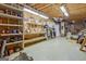 Basement with wood beams and shelving for plenty of storage at 305 Postwood Dr, Fayetteville, GA 30215