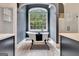 Elegant bathroom featuring a clawfoot tub under a large window with a view of the lush outdoors at 305 Postwood Dr, Fayetteville, GA 30215