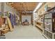 Spacious garage with garage door, lighting, and storage at 305 Postwood Dr, Fayetteville, GA 30215