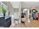 Second-floor hallway with hardwood flooring and natural light at 305 Postwood Dr, Fayetteville, GA 30215