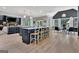Large kitchen with a breakfast bar, modern appliances, and an open layout, perfect for Gathering gatherings and entertaining at 305 Postwood Dr, Fayetteville, GA 30215