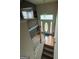 Elegant entryway featuring decorative door with sidelights and a stylish chandelier, welcoming guests with charm and sophistication at 650 Flippen Rd, Stockbridge, GA 30281