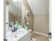 Bathroom with vanity, cleaning supplies, and a toilet at 115 Glen Echo Dr., Covington, GA 30016