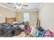 Bedroom with neutral walls, wooden flooring and a ceiling fan at 115 Glen Echo Dr., Covington, GA 30016