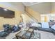 Spacious living room with high ceilings and lots of natural light, providing a versatile and comfortable area at 115 Glen Echo Dr., Covington, GA 30016