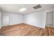 Large, unfinished basement with hardwood flooring offering flexible space for customization at 2010 Pearwood Path, Roswell, GA 30076