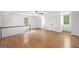 Bright bonus room featuring hardwood floors, neutral walls and a large window for natural light at 2010 Pearwood Path, Roswell, GA 30076