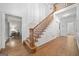 Spacious foyer features hardwood floors, staircase, and classic trim work at 2010 Pearwood Path, Roswell, GA 30076