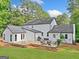 Expansive backyard featuring a spacious deck with ample seating, ideal for outdoor entertaining at 2885 Laurel Green Ct, Roswell, GA 30076