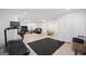 Finished basement with exercise area, lounge area, and plenty of storage space at 2885 Laurel Green Ct, Roswell, GA 30076