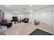 Spacious basement featuring durable flooring, shiplap walls and modern furniture perfect for cozy gatherings at 2885 Laurel Green Ct, Roswell, GA 30076