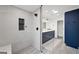 Modern bathroom featuring glass-enclosed shower, sleek vanity, and stylish tile work at 2885 Laurel Green Ct, Roswell, GA 30076