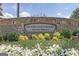Stone sign for Country Club of Roswell, Willow Springs with flowerbeds at 2885 Laurel Green Ct, Roswell, GA 30076