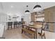 Open-concept kitchen and dining area with modern finishes and natural light at 2885 Laurel Green Ct, Roswell, GA 30076