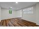 Bright basement featuring wood flooring, recessed lighting, and white trim at 1124 Ponderosa Park Dr, Forest Park, GA 30297