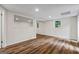 Finished basement featuring wood flooring, recessed lighting, and white trim at 1124 Ponderosa Park Dr, Forest Park, GA 30297