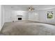 Spacious basement with carpet, fireplace and natural light offering flexible space for living at 1124 Ponderosa Park Dr, Forest Park, GA 30297