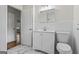 Bathroom with modern vanity and fixtures, tile flooring, and bright lighting at 1124 Ponderosa Park Dr, Forest Park, GA 30297