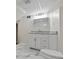 Finished basement bathroom with granite countertop, and tile floors at 1124 Ponderosa Park Dr, Forest Park, GA 30297