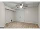 Finished bedroom space with carpet, ceiling fan, and white trim at 1124 Ponderosa Park Dr, Forest Park, GA 30297