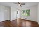 Bedroom with hardwood floors, closet, and windows offering natural light at 1124 Ponderosa Park Dr, Forest Park, GA 30297