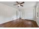 Bedroom with hardwood floors, ceiling fan, closet, and natural light at 1124 Ponderosa Park Dr, Forest Park, GA 30297